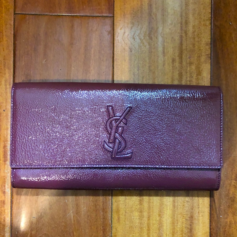 Used YSL clutch in purple patent leather
